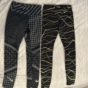 2 pairs NIKE leggings women’s size small patterns and gold lines
